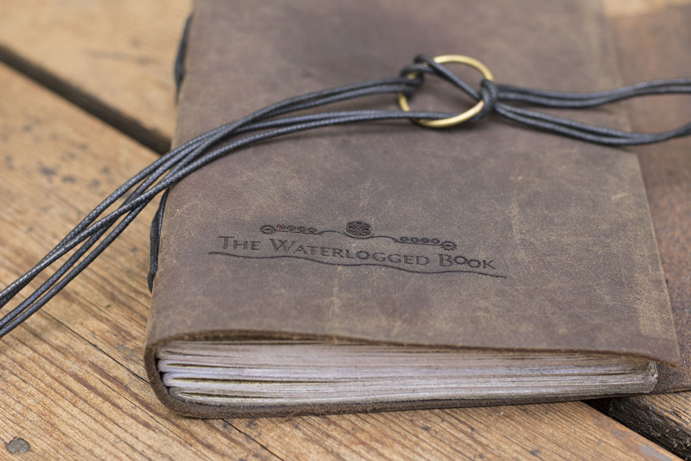 closeup of a burned logo in leather