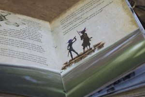 closeup page of pair on a raft rendering