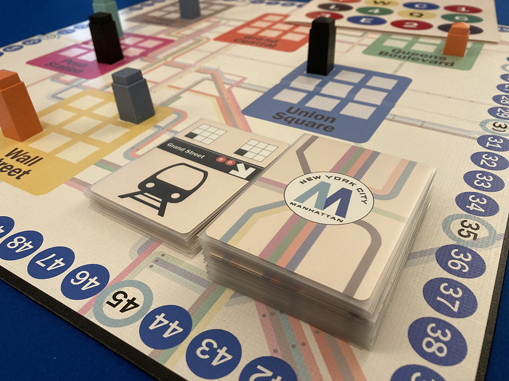 closeup of Manhattan cards on board